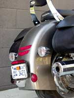 The Honda's flush, Rune-like chevrons and bullet turns are as trick as can be. Most customs aren't this cool.